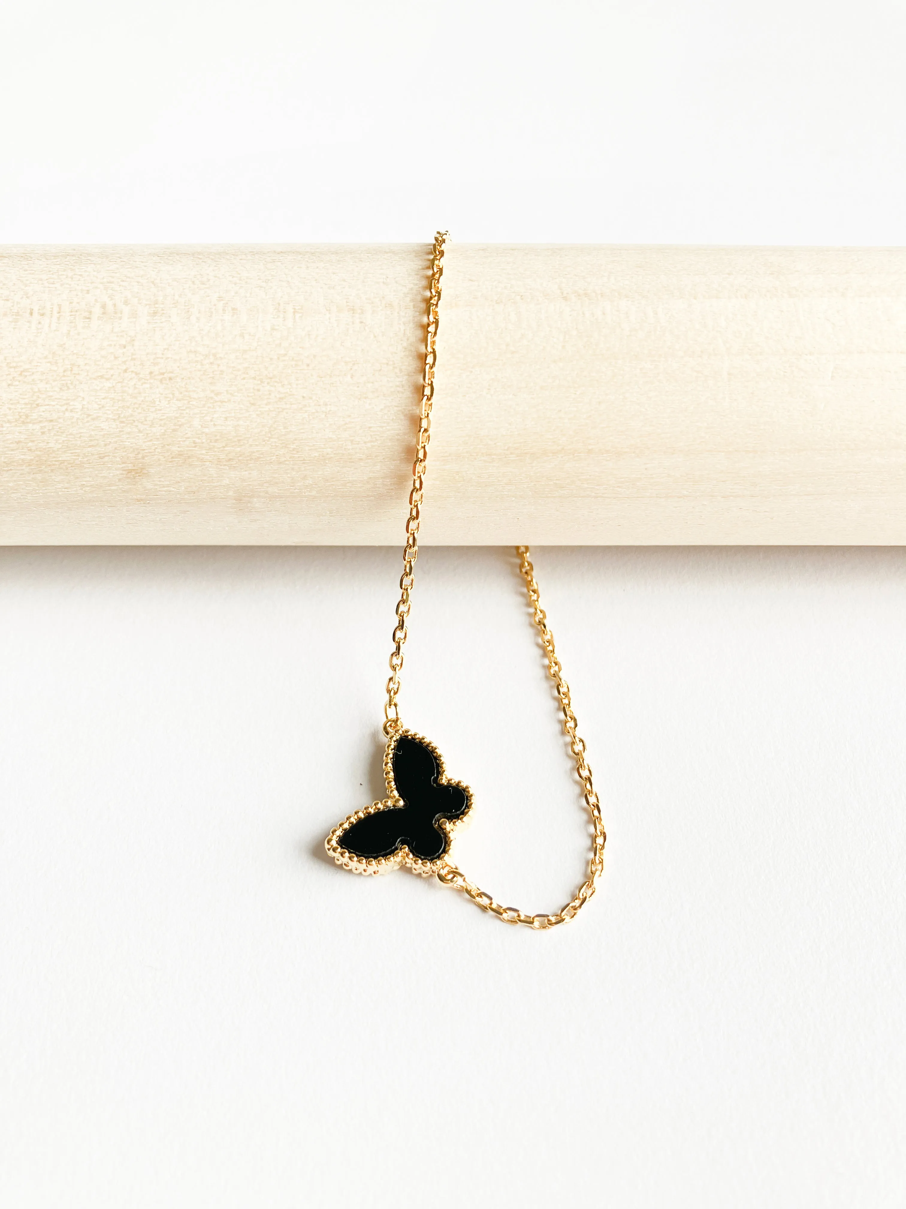 Adjustable Onyx Butterfly Motif Bracelet in Gold