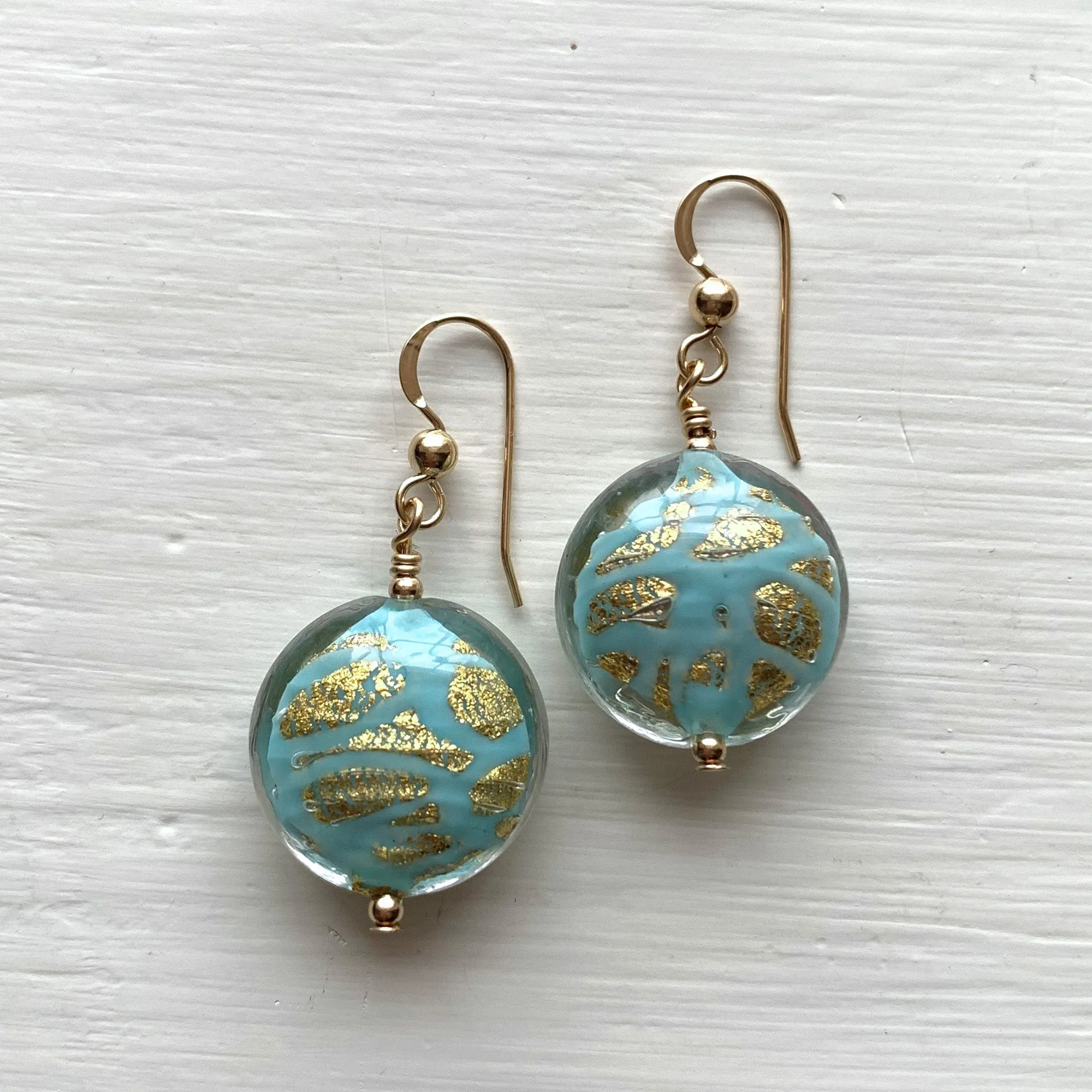 Earrings with turquoise (blue) pastel graffiti and gold Murano glass medium lentil drops