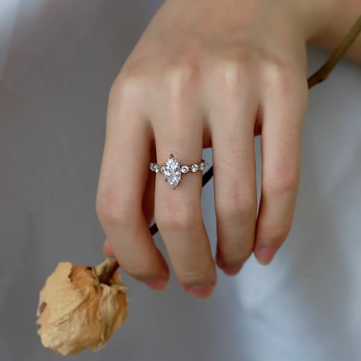 Prong Set Side Stone 1.5 Ct Marquise Engagement Ring