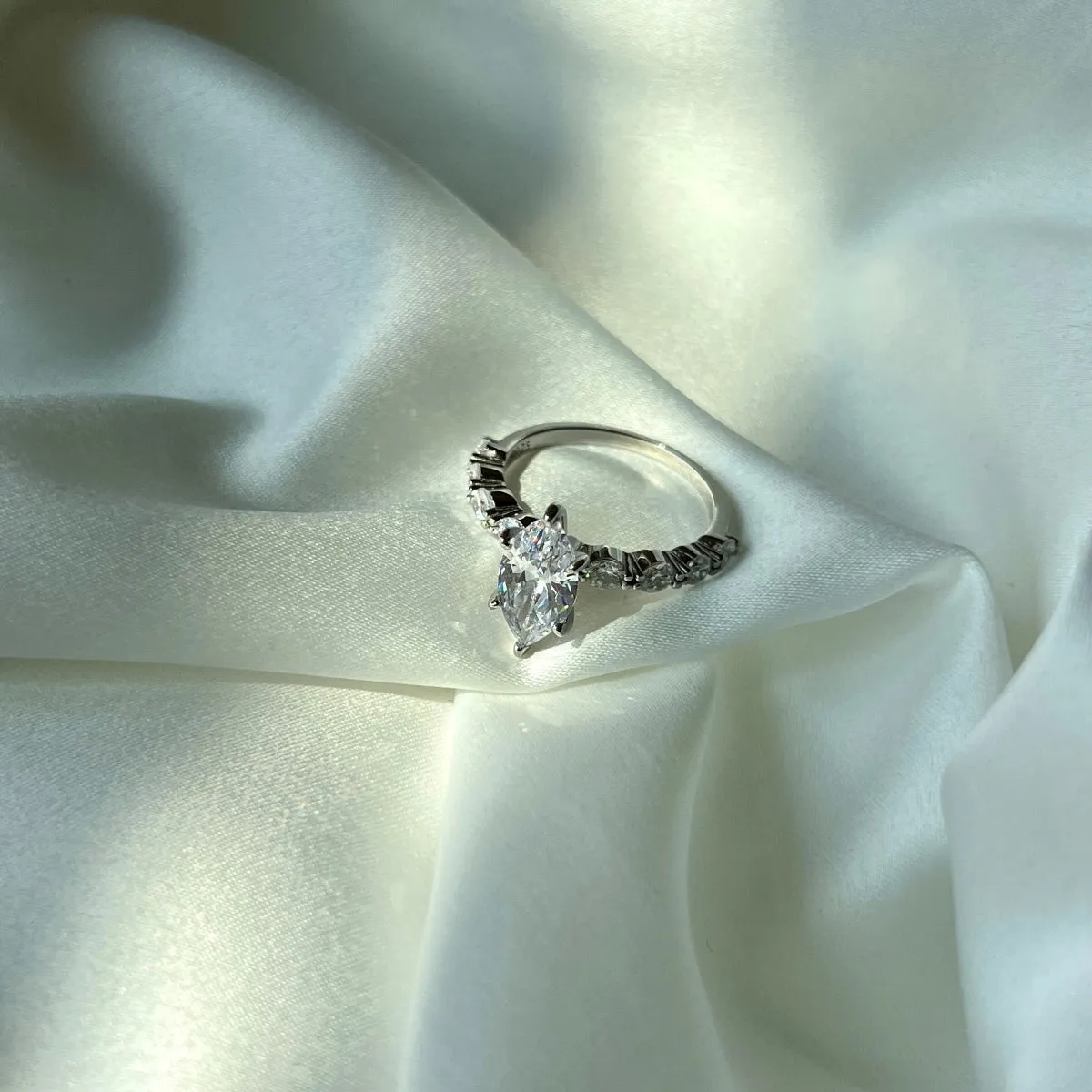 Prong Set Side Stone 1.5 Ct Marquise Engagement Ring